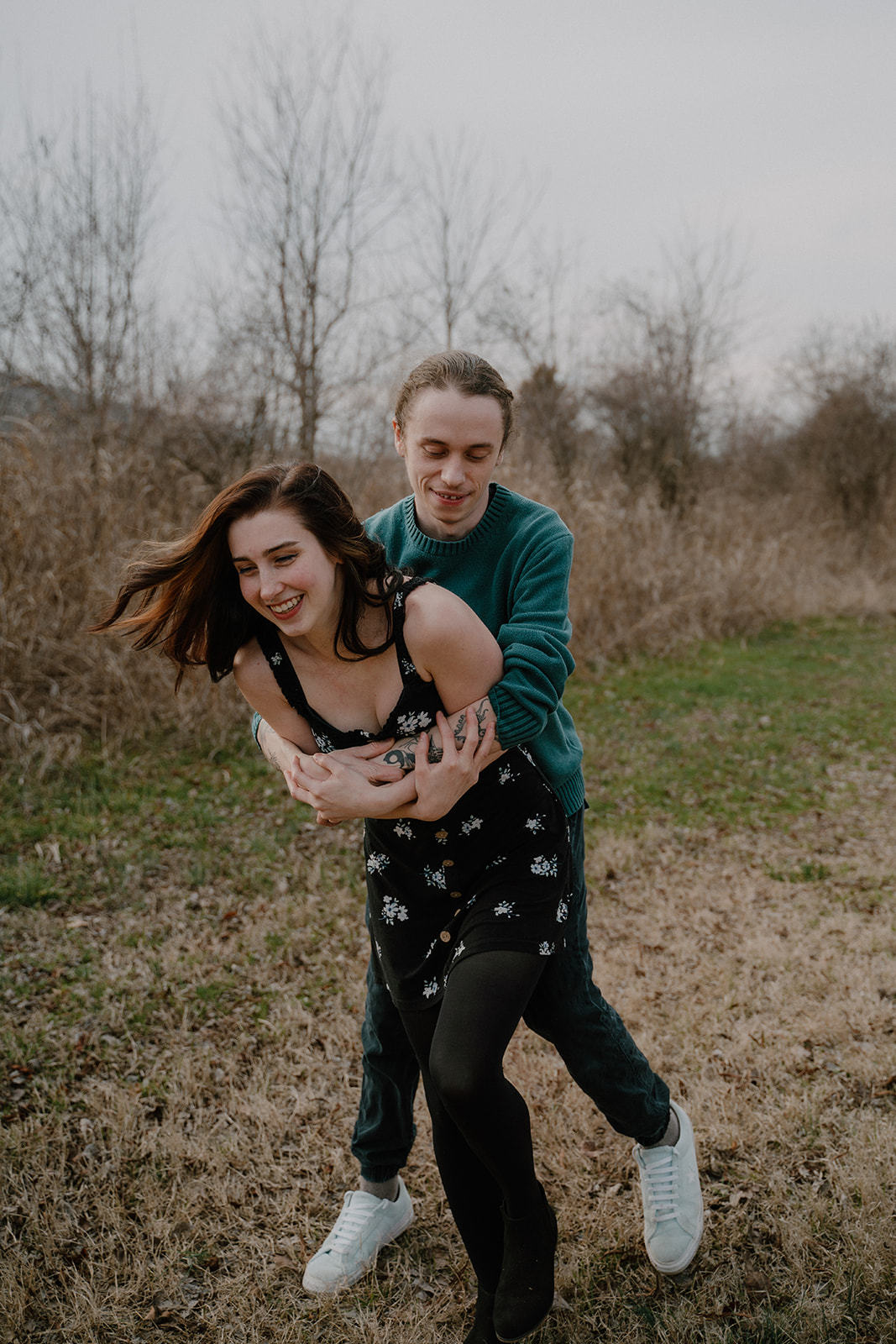 photo of couple playing during their photoshoot