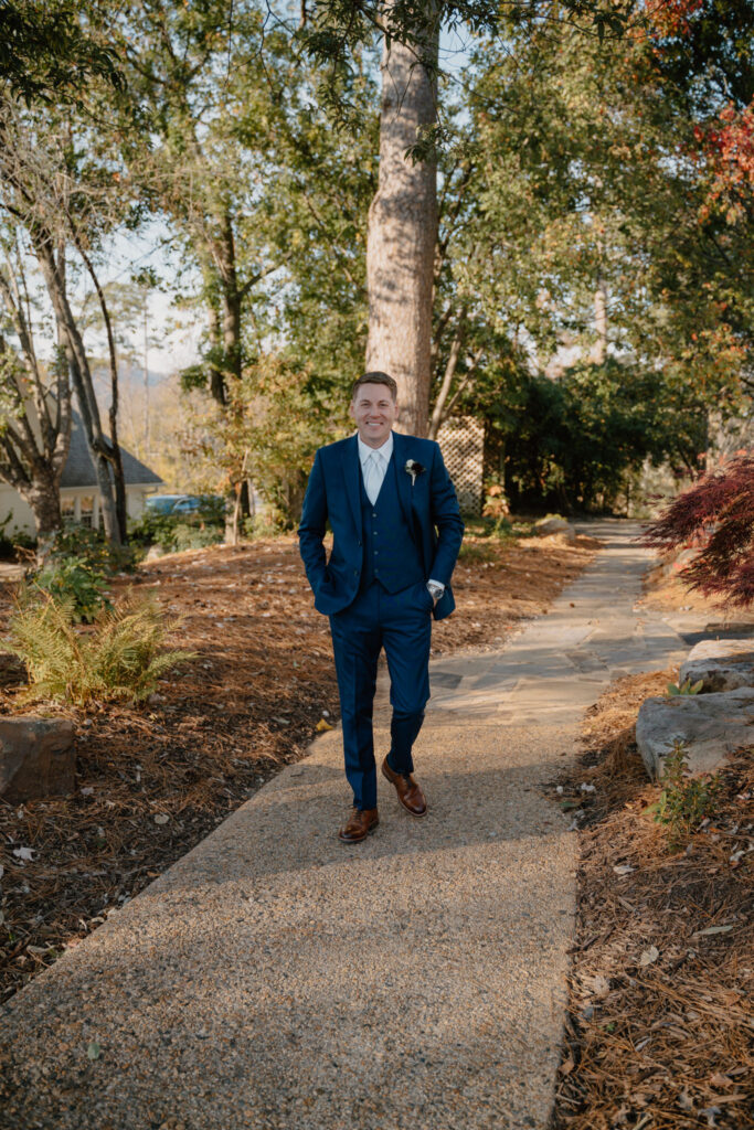 photo of groom walking