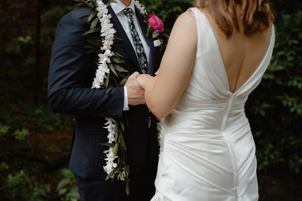 photo of bride and groom holding hands