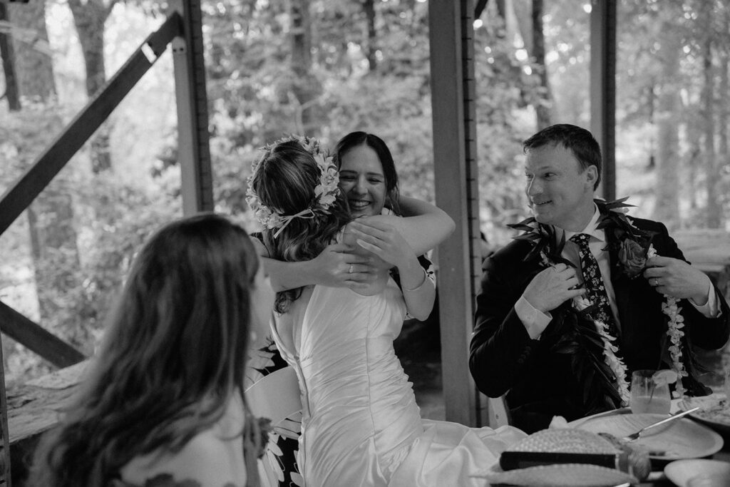 photo of bride hugging her friend