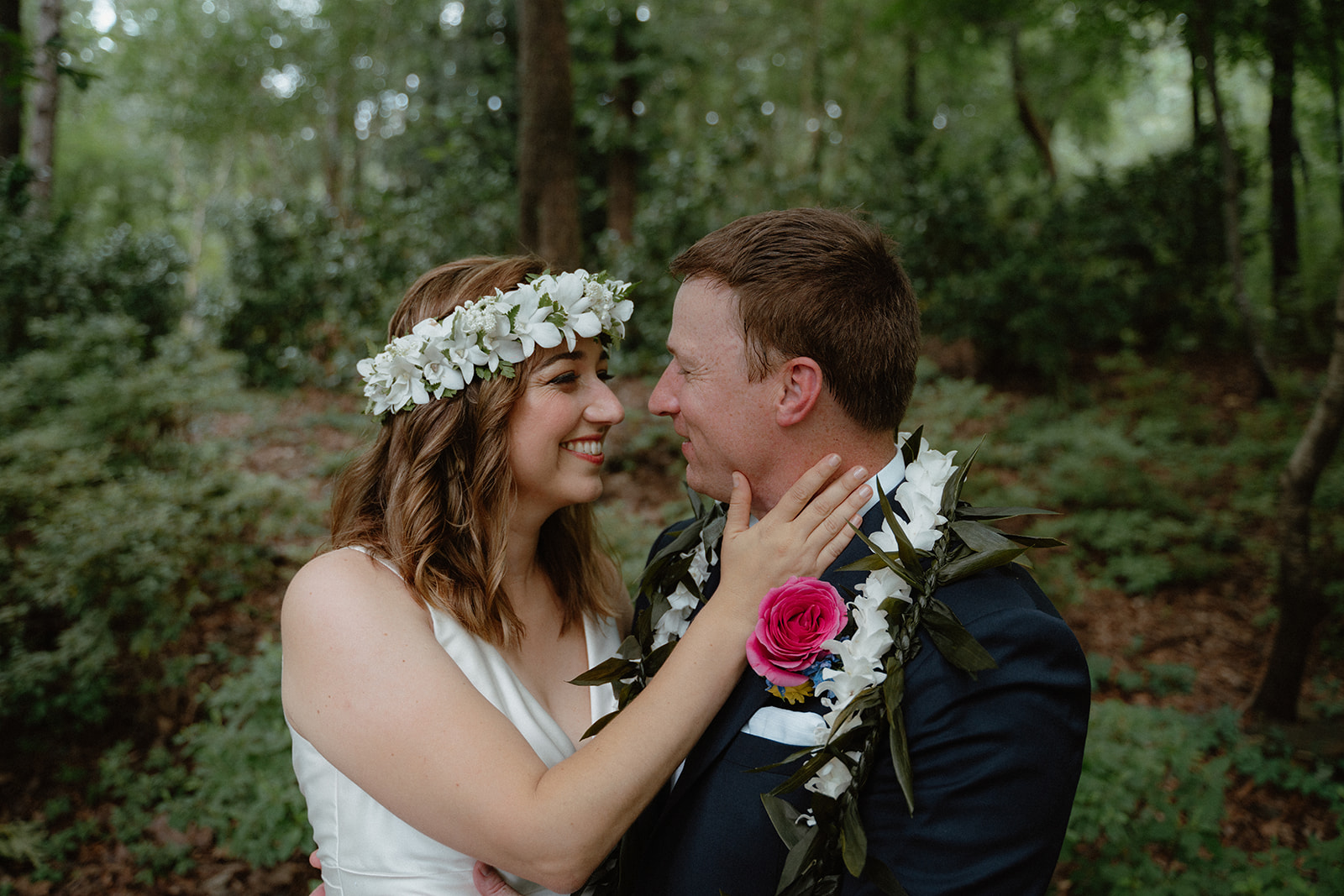 Photo of bride and groom in the forrest in Hot Springs at Garvan Gardens