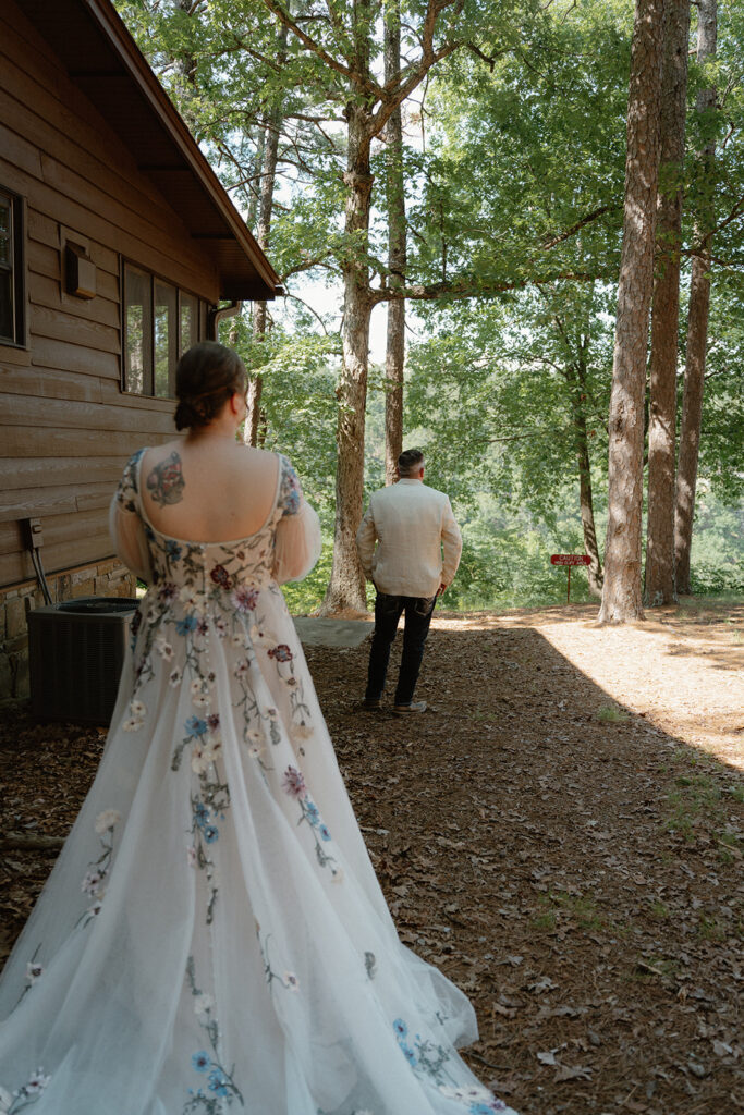 photo of bride and father of the bride's first look