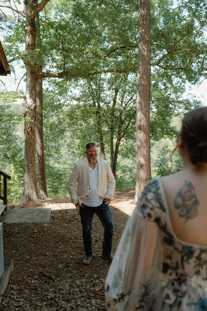 photo of bride and father of the bride's first look