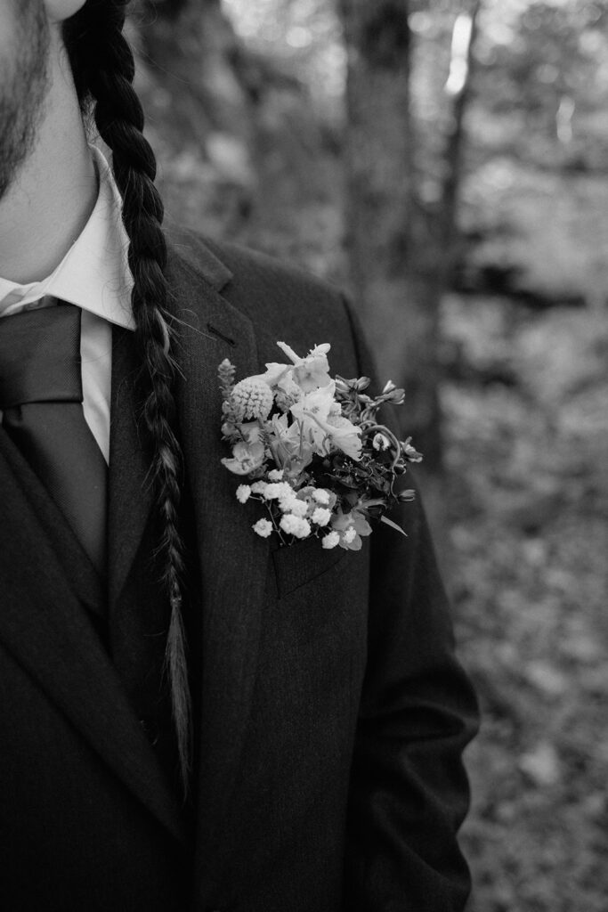 photo of groom's floral accessory