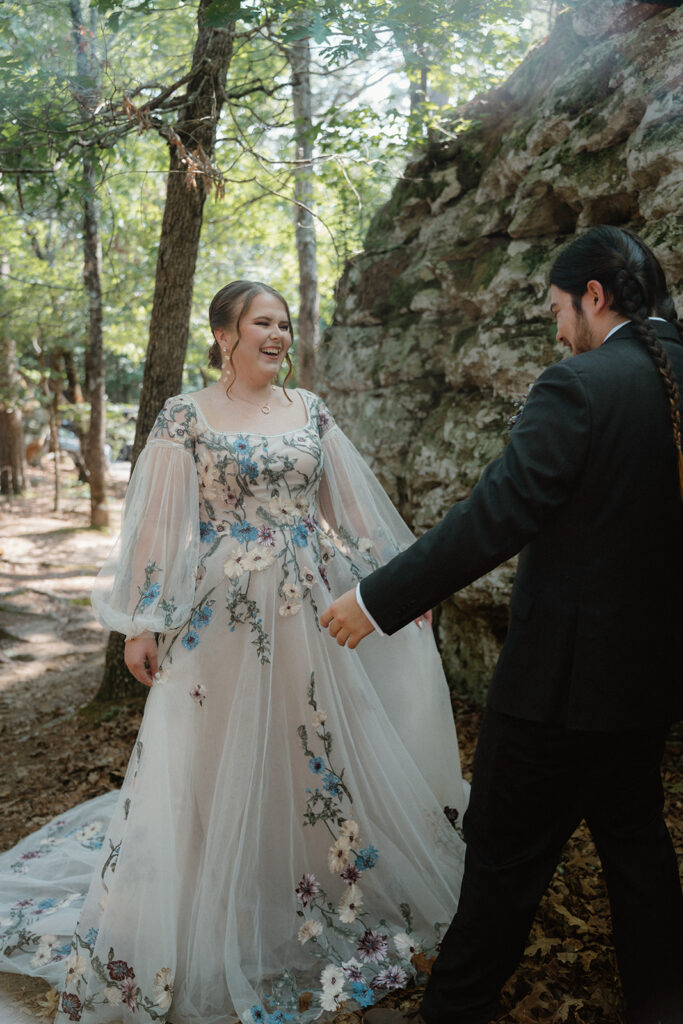 photo of bride and groom at their first look