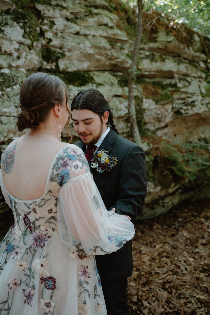 photo of bride and groom at their first look