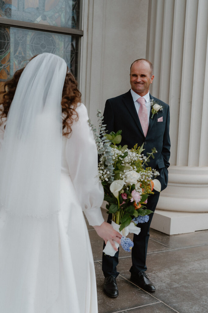 photo of first look with father of the bride