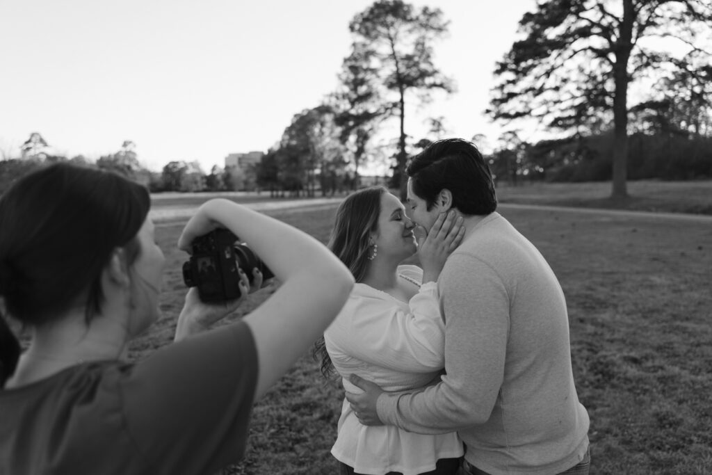 photo of photographer taking photo of couple