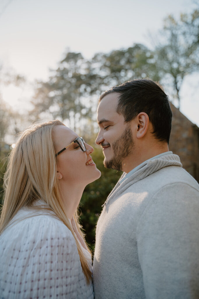 Photo of couple snuggling in close before a kiss