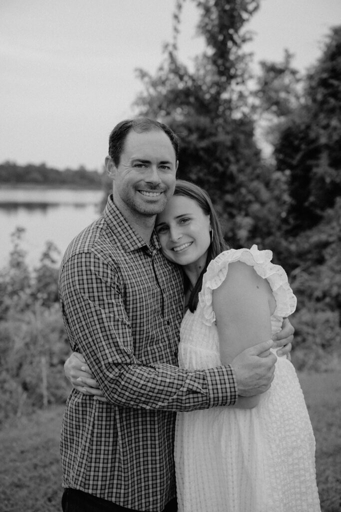 photo of engaged couple snuggling