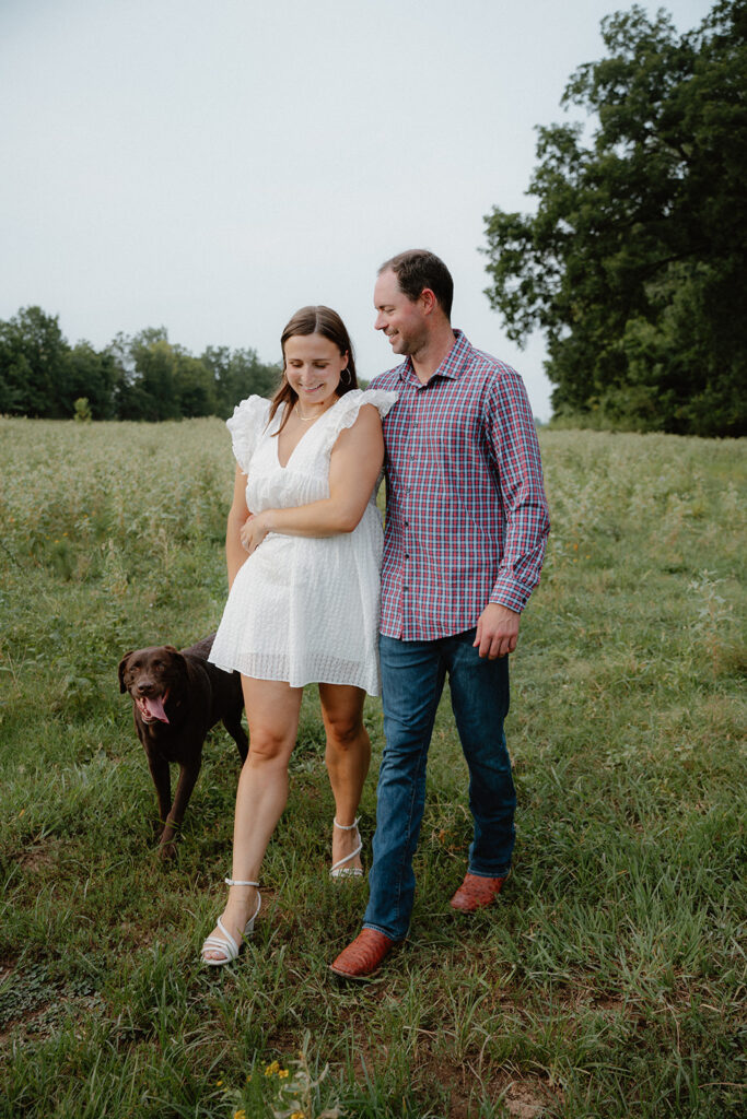 photo of engaged couple and their dog