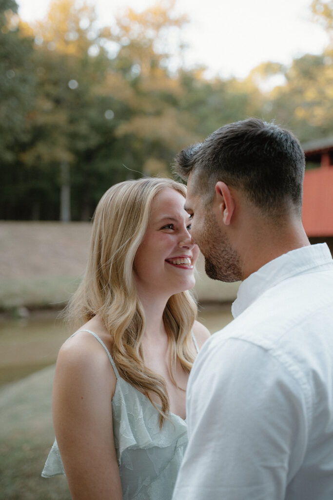 engaged couple posing for photo