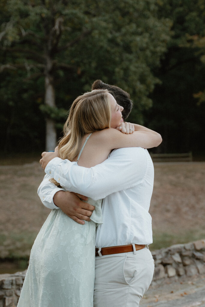 photo of couple hugging during their engagement photography session