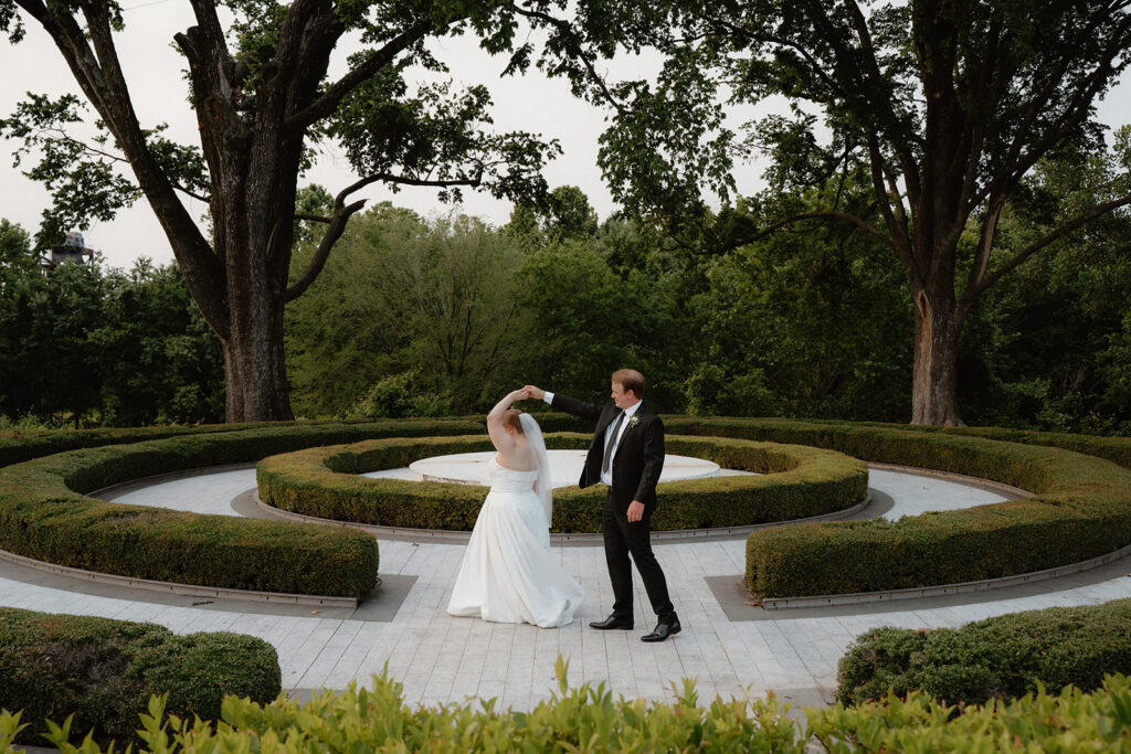 photo of bride and groom dancing after getting married in Arkansas